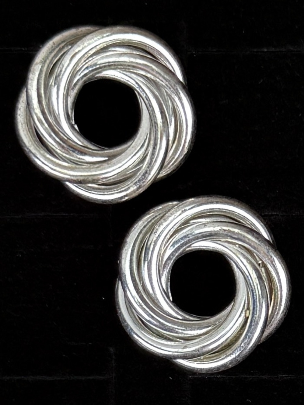 Vintage Silvertone weighted twisted circle pierced earrings